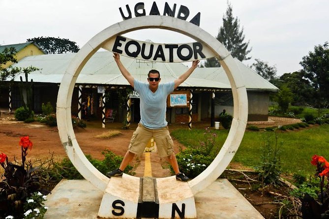 A Tour To Uganda Equator - Stop 1: Green Equator Masaka Road and the Equator Line Photo Time