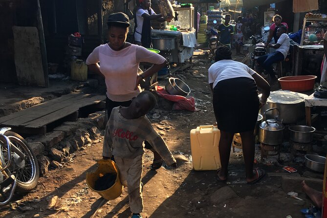 Half day Kampala City Motor Bike Tours - Katanga Slum and Makerere University: Two Different Views of Kampala