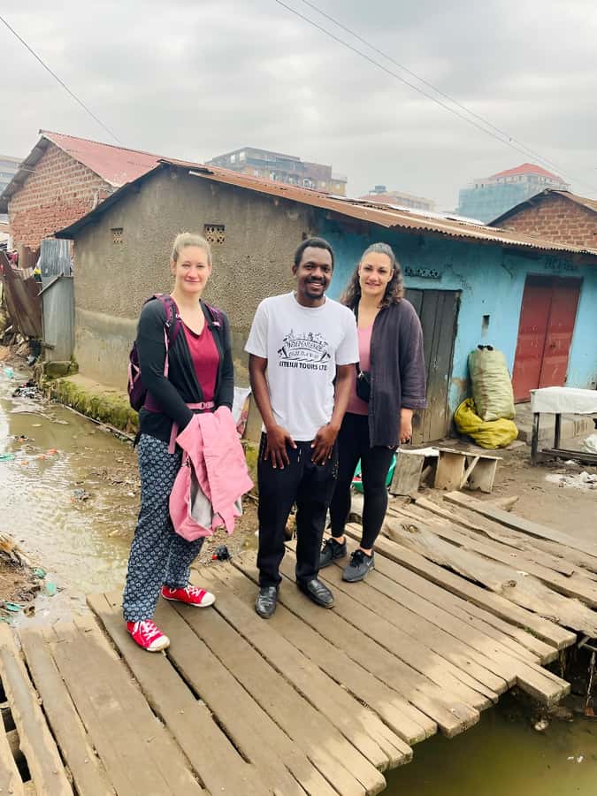 Kampala: Katanga Slum Guided Walking Tour - Churches, a small gym area, and community spaces that shape daily life